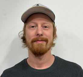 Porträttbild på medarbetare Adam Hassel